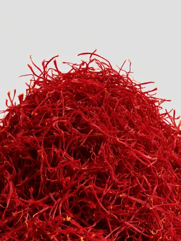 Pile of red saffron threads filling the frame